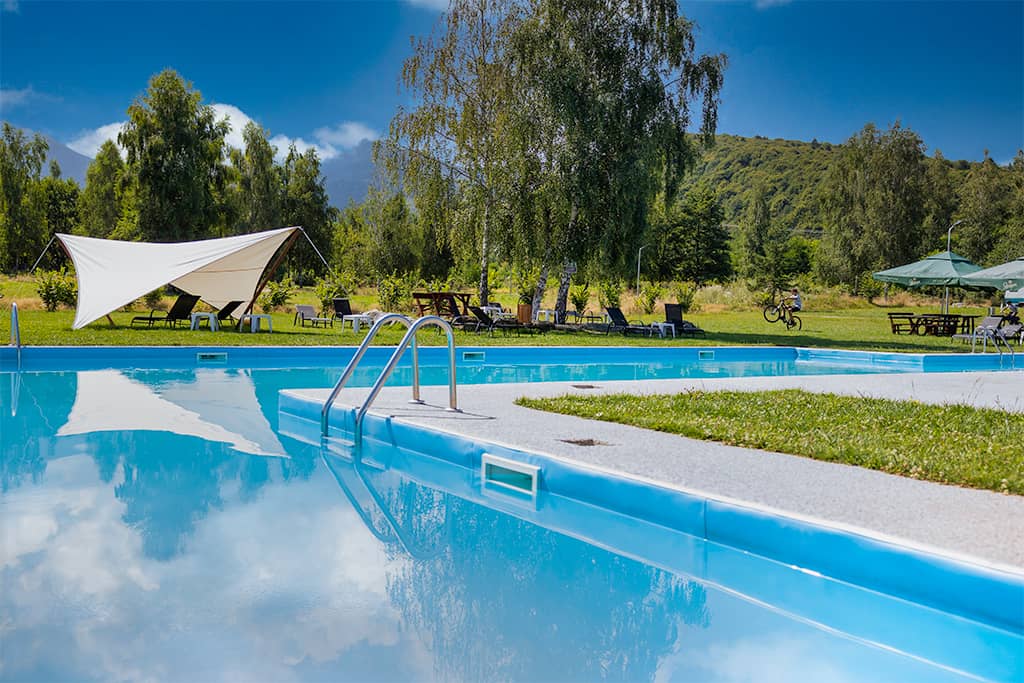 The outdoor pool under a clear sky