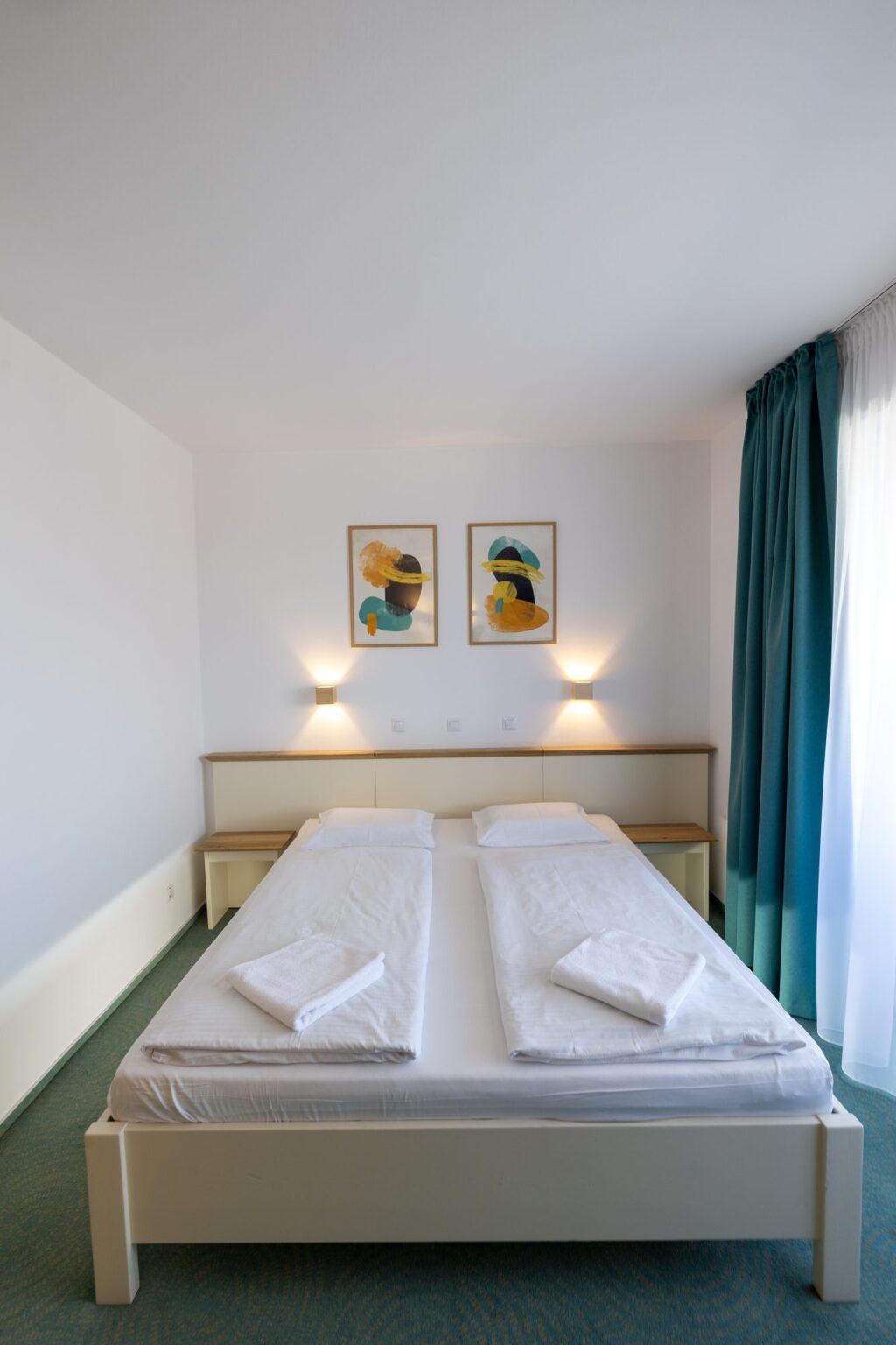 The double bed seen from its foot